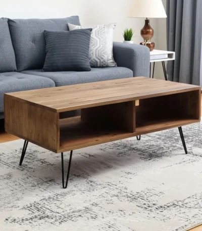 Goldoma 23-inch industrial coffee table with storage shelf, brown wood top and black metal frame in a living room