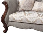 Goldoma genuine leather loveseat in beige and dark brown with tufted backrest and toss pillows