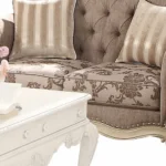 Gray and off-white damask chesterfield loveseat with sleeper function and toss pillows by Goldoma