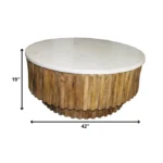 Goldoma 42 inch round marble coffee table with genuine ivory marble top and natural solid wood ribbed base in a modern living room