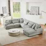 Goldoma 101.2-inch beige corduroy sectional sofa with deep seating and side pockets in a living room
