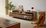 Goldoma modern TV stand with LED lights and charging ports for TVs up to 75 inches featuring four drawers and tempered glass top