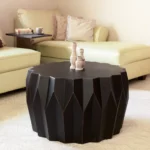Goldoma solid wood coffee table in black with distressed drum shape and 29-inch round top
