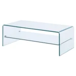 Goldoma 43-inch glass sled coffee table with brass frame and lower shelf in a modern living room