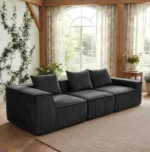 Goldoma corduroy L-shape sectional sofa in beige with tufted back and wood legs