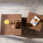 Vintage boho nesting coffee table set in warm brown solid wood with two tables nested