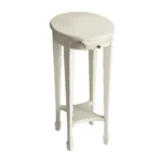 Goldoma 26 inch white oval end table with shelf in a living room setting