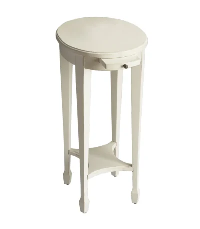 Goldoma 26 inch white oval end table with shelf in a living room setting