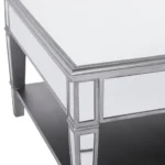 Goldoma 29 inch silver mirrored square coffee table with shelf and drawers in a modern living room