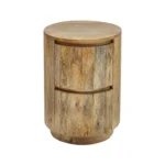 Goldoma solid wood drum end table with two drawers in natural finish, 24-inch height, placed next to a sofa