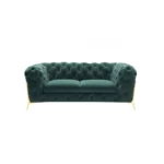 Goldoma 74-inch emerald velvet tufted Chesterfield loveseat with gold legs in a living room setting