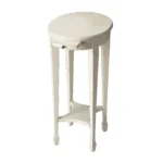 Goldoma 26 inch white oval end table with shelf in a living room setting