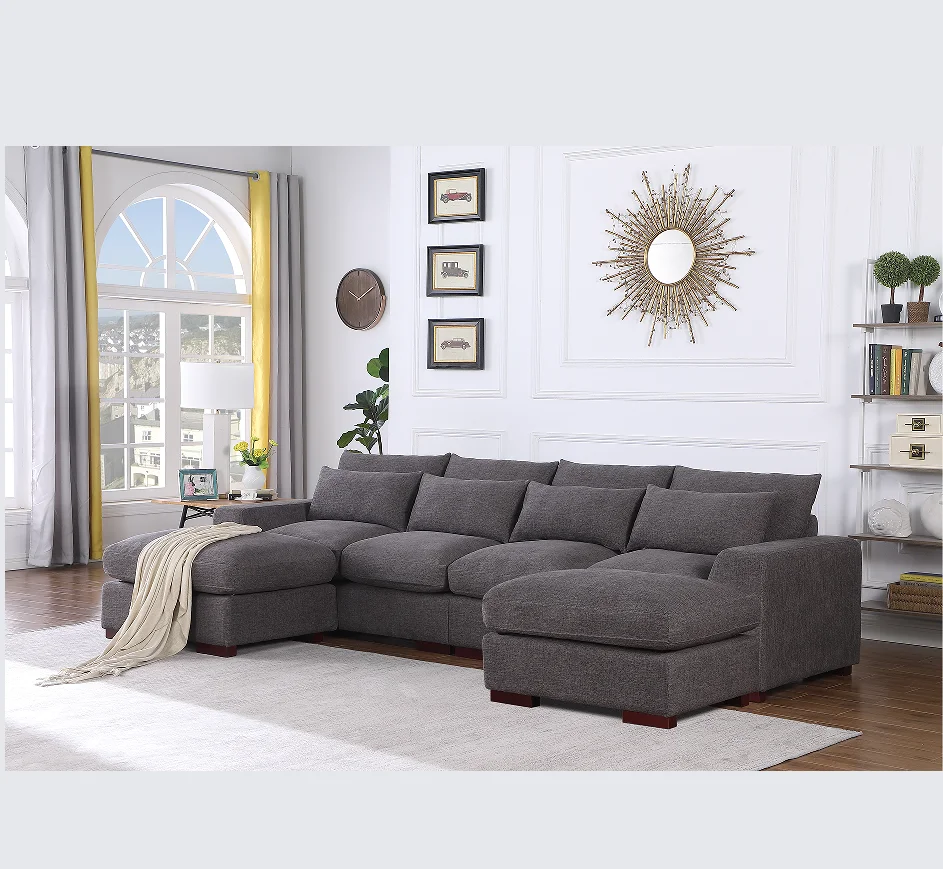Hbdaf5f68026b473c861cd1e30a4343c2R.webp U-shaped sectional sofa with two ottomans and reclining seats in a modern living room