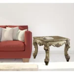 Goldoma 26 inch gold patina square end table in living room setting with elegant finish