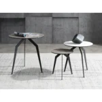 Goldoma 20 inch black and gray ceramic round end table with black iron base in a modern living room setting
