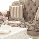 Gray and off-white damask chesterfield loveseat with sleeper function and toss pillows by Goldoma