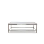 Goldoma 55-inch clear glass coffee table with silver steel frame in modern living room setting