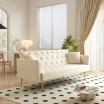 Modern 72-inch convertible sofa bed velvet tufted loveseat in beige, converted to bed mode in a living room