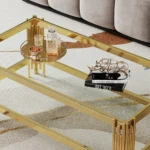 Goldoma double layer tempered glass coffee table with gold stainless steel frame in modern living room