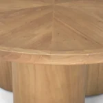Goldoma 39-inch natural solid wood round pedestal coffee table with mango oak and scalloped base in living room