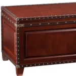 Brown solid wood coffee table with hidden storage in living room setting