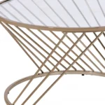 Goldoma 32-inch round tempered glass coffee table with champagne metal base in a modern living room