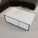 Goldoma smart coffee table with mini fridge and wireless charging in modern living room