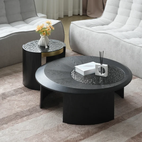 Goldoma modern round coffee table with hammered glass top and wood accents in a living room