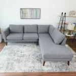 Goldoma Benson Grey Fabric Right-Facing Chaise Sectional Sofa in a modern living room