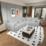 Goldoma modular power recliner sofa bed L-shaped sectional with adjustable headrests and pull-out bed in a modern living room