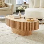 Goldoma modern oval coffee table with sturdy pedestal base in living room