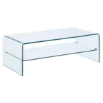 Goldoma 43-inch glass sled coffee table with brass frame and lower shelf in a modern living room