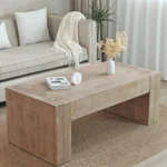 Goldoma 49-inch farmhouse coffee table in black engineered wood with antique finish, placed in a living room