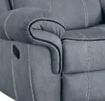 Goldoma velvet reclining loveseat with tufted back and storage armrests in a modern living room