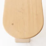 Goldoma 60-inch solid pine wood oval console table with natural finish in a living room setting