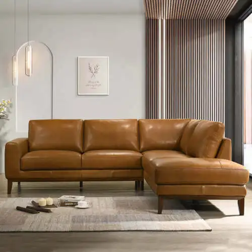 He035aeb0008443cca061d203f991869c9.webp Goldoma London right facing convertible sectional sofa bed in tan PU leather with chenille fabric, L-shaped modern design