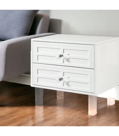 Clear acrylic end table with two drawers and white lacquered top in living room setting