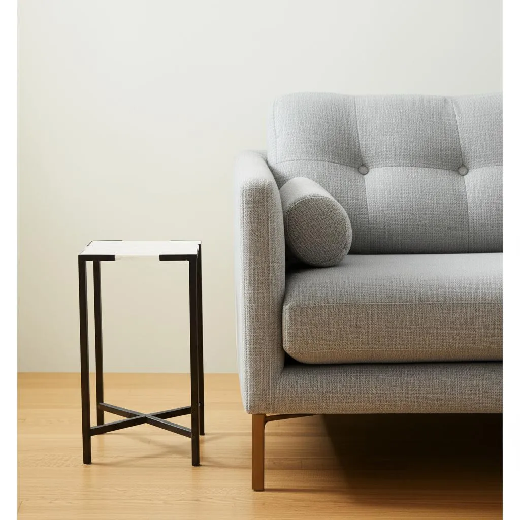 Hecc2979ca0924a889bd161b3740a89096.webp Goldoma 24 inch farmhouse marble end table with white marble top and black abstract iron base in living room setting