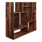 Goldoma tall narrow bookcase 10-tier in brown and natural wood against a living room wall with books and decor