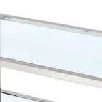 Modern coffee table with tempered glass top and steel frame in a living room