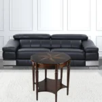 Goldoma 28-inch round coffee table with brown wood top and black metal shelf in a modern rustic living room