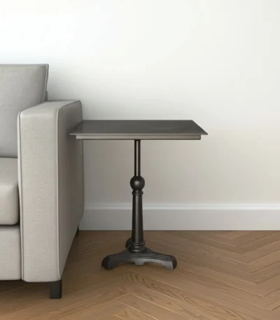 Rustic side table - 30-inch brown iron square pedestal end table with distressed finish placed beside a sofa