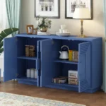Goldoma navy blue vintage distressed 4-door sideboard with adjustable shelves and geometric embossed panels in a living room setting