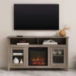 Goldoma 58-inch tall TV stand with fireplace in driftwood finish holding a TV, showcasing rustic design and electric LED flames