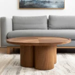 Goldoma 39-inch natural solid wood round pedestal coffee table with mango oak and scalloped base in living room