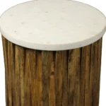 Marble round end table with brown solid wood base and ivory marble top in a living room setting