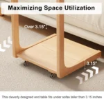 Goldoma C-shaped end table with lockable wheels in natural wood finish, placed under a sofa as a rolling side table