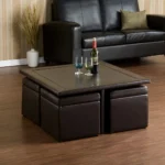 Goldoma coffee table and storage ottoman set with wood-grain veneer tabletop and dark brown faux leather ottomans