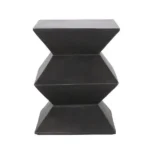 Goldoma lightweight concrete outdoor side table with geometric design on a patio