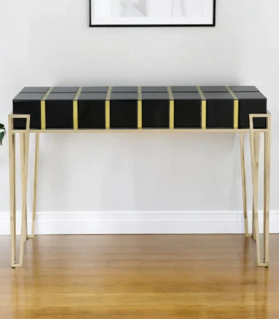 Black and gold mirrored glass console table 47 inch with gold hairpin legs in entryway decor setting